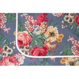 Mantel impermeable flores fondo celeste