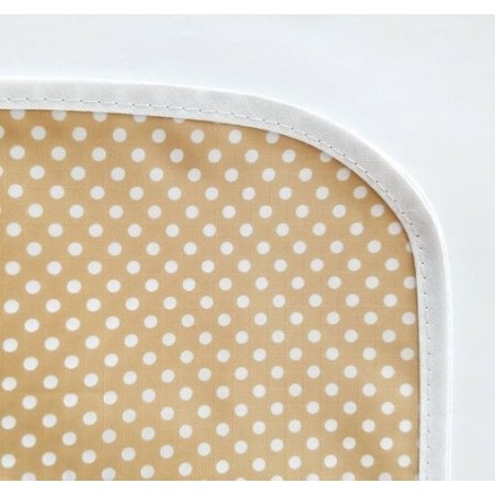 Mantel impermeable lunares beige y blanco